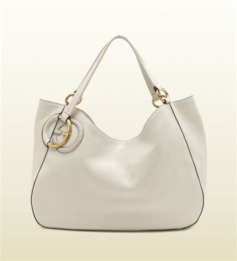 gucci white leather shoulder bag from the 70s or 80s|vintage Gucci overnight bag.